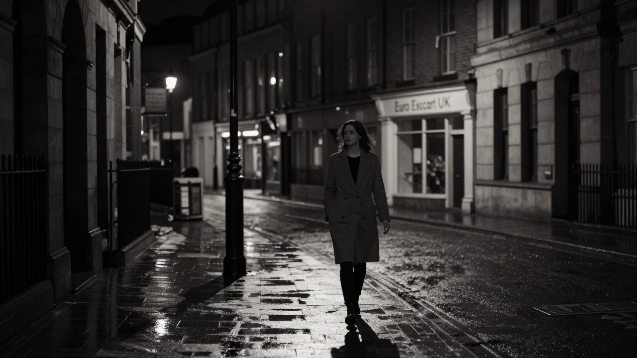 A confident woman walks alone under a streetlamp in Manchester, the evening quiet and dignified.